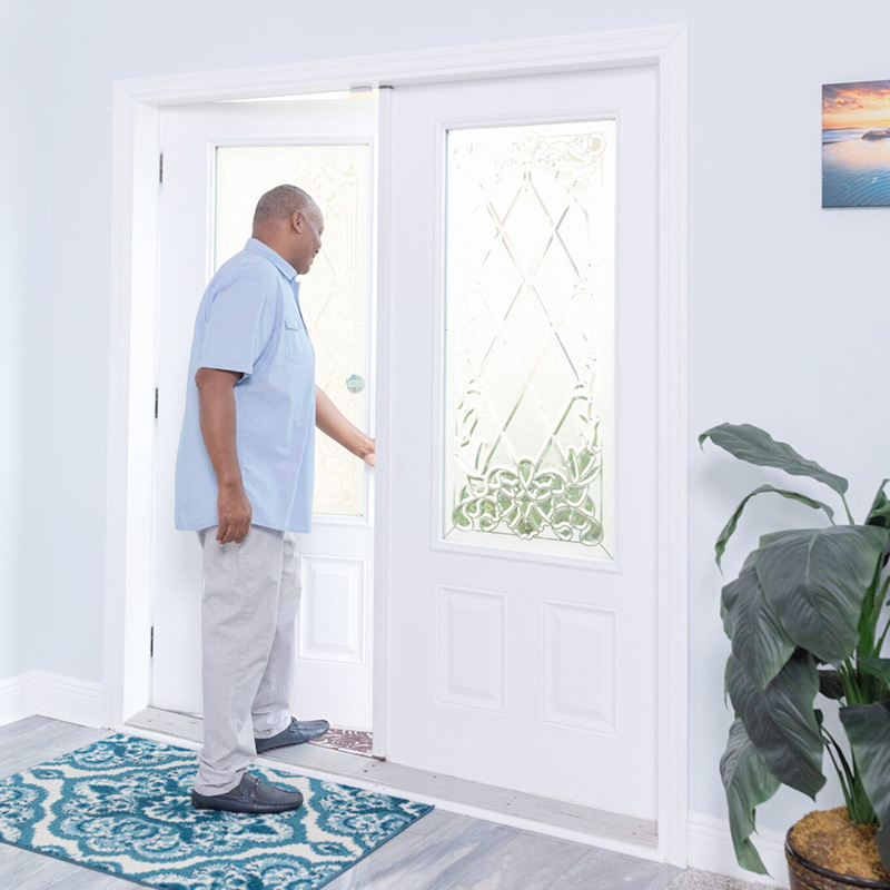 Wallaby Windows professional front door installation service featuring a decorative glass entry door designed for energy efficiency, security, and enhanced curb appeal in coastal North Carolina homes