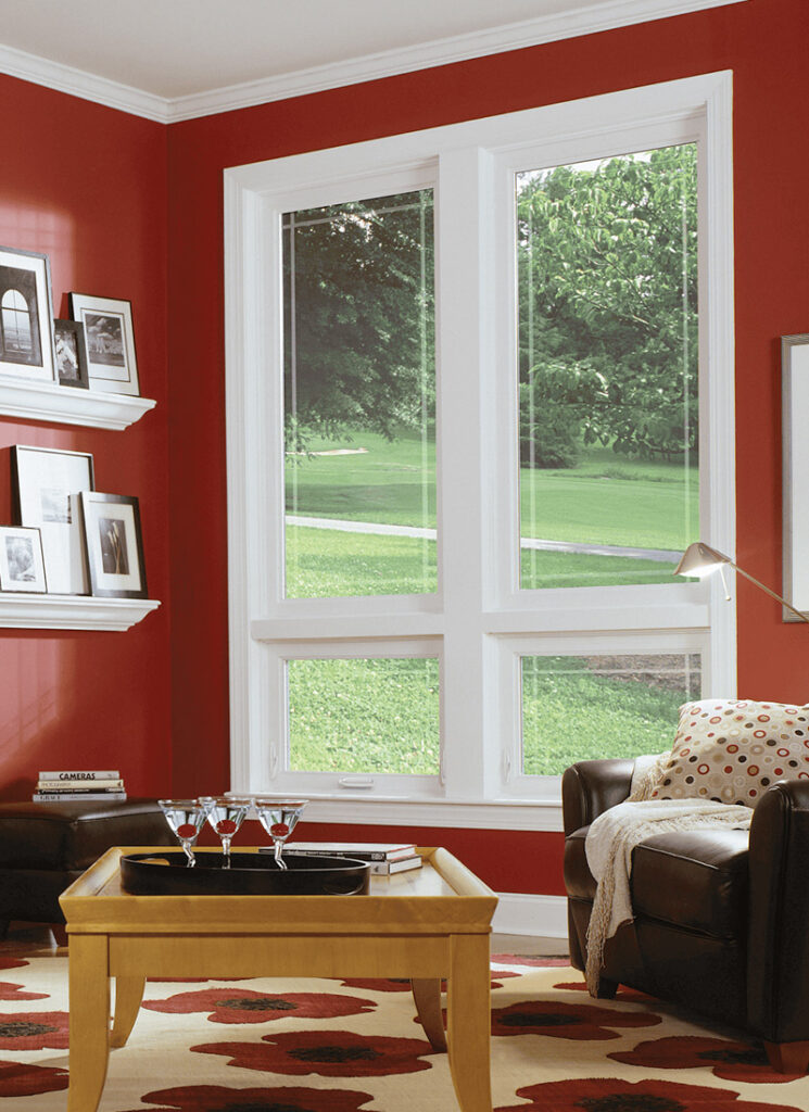 Energy Efficient Windows for Wilmington and Coastal Carolina Homes double hung windows in a vibrant living room providing natural light, energy efficiency, and reliable performance for coastal North Carolina homes