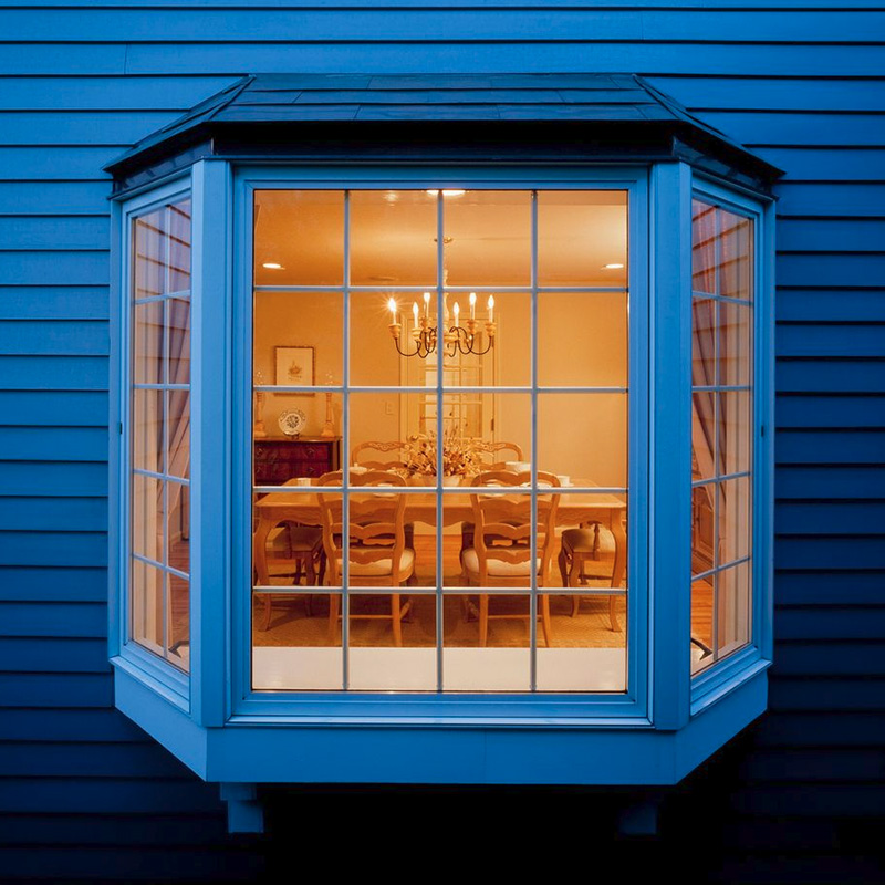 Bay and Bow Windows in Wilmington and Coastal Carolina exterior bay window with fixed center pane and side casement windows enhancing curb appeal, natural light, and energy efficient home design