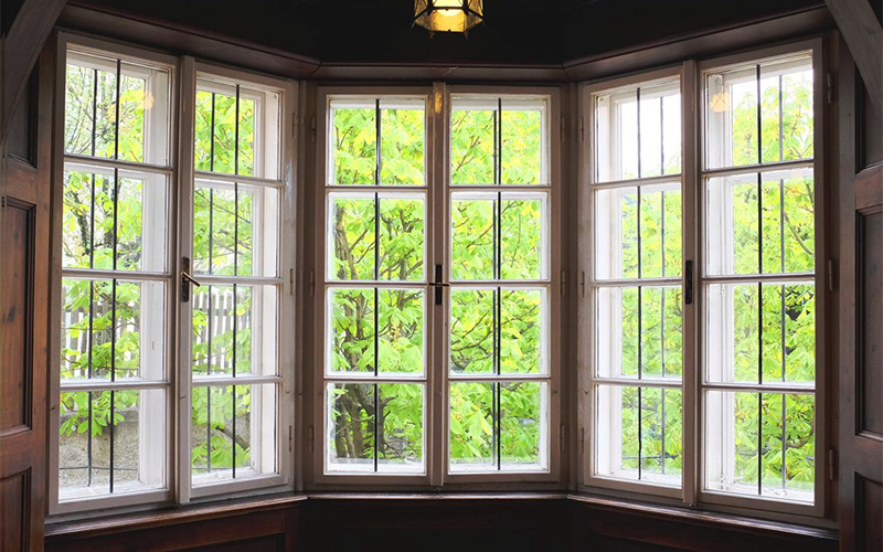 casement window bay configuration with multiple operable panels offering ventilation, expansive outdoor views, and energy efficient performance