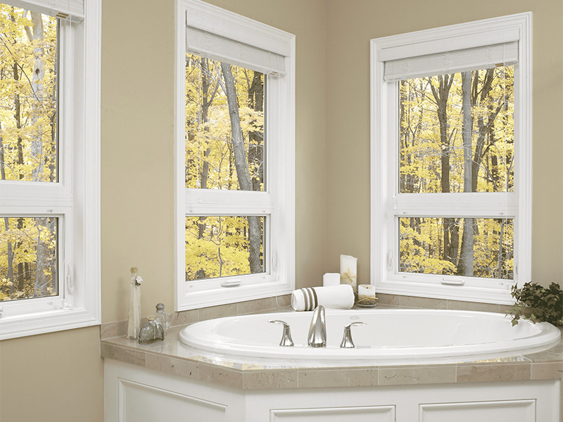 Coastal Performance Considerations double hung windows in a bathroom providing ventilation, natural light, and moisture control with reliable coastal performance in Wilmington homes