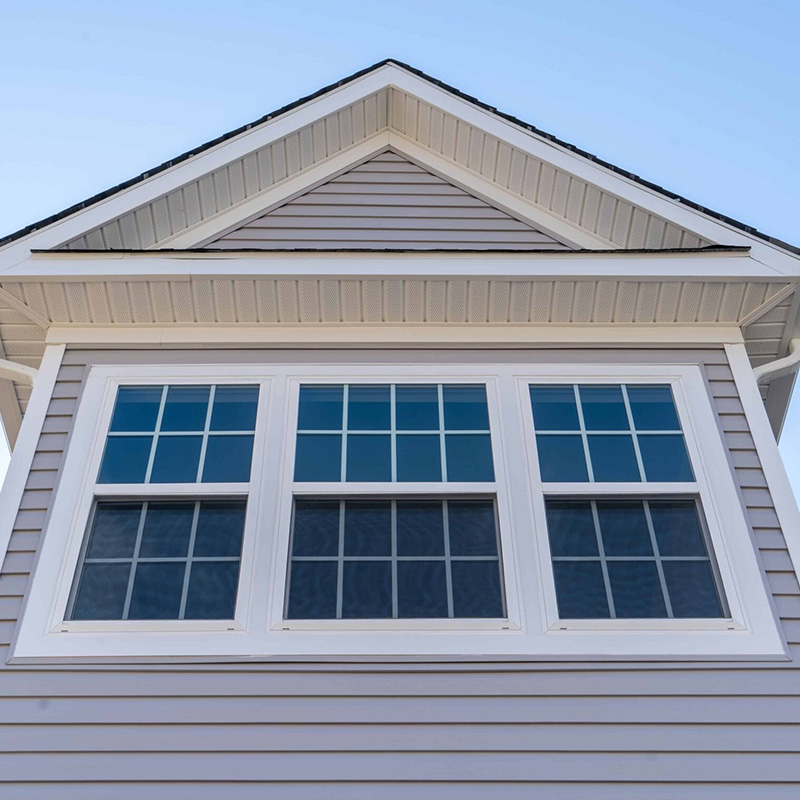 fixed windows installed in a coastal Carolina home providing expansive views, natural light, and durable performance in coastal weather conditions
