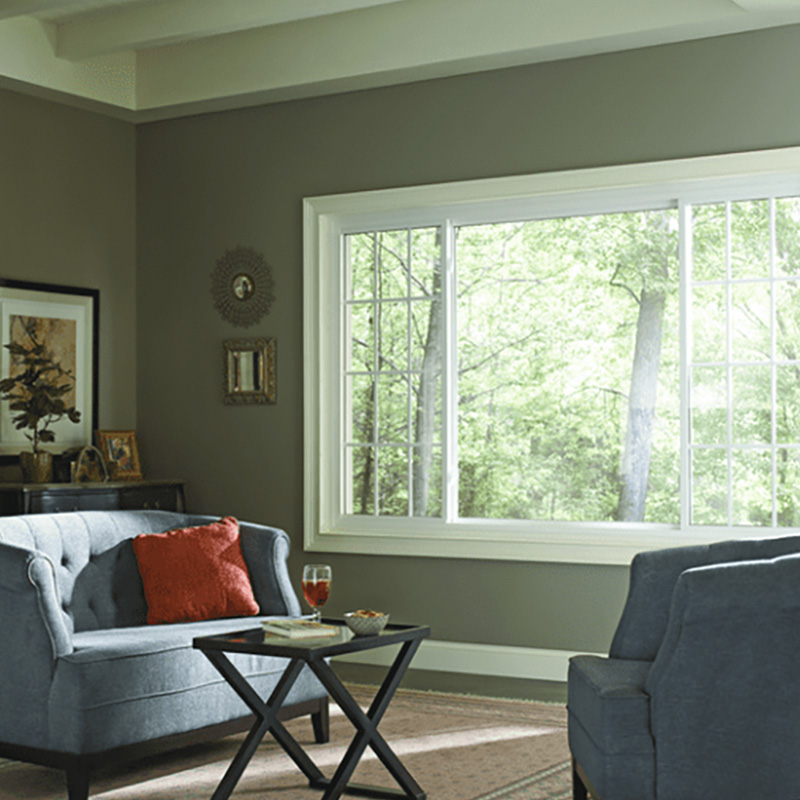 large picture window installation providing expansive outdoor views and natural light with tight sealing for long term performance in coastal North Carolina