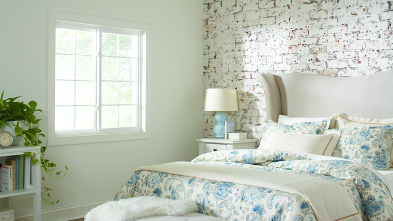 energy efficient double hung window bringing in natural light to a bedroom while improving comfort and insulation for a Wilmington home