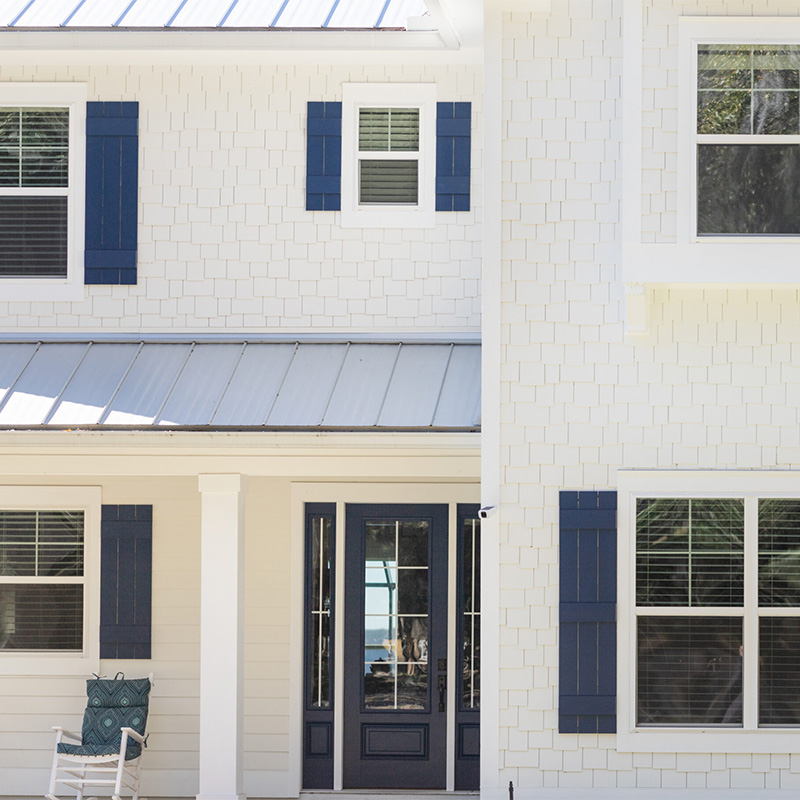 coastal Carolina home exterior with professionally installed windows designed for durability curb appeal and long term performance in Wilmington climate