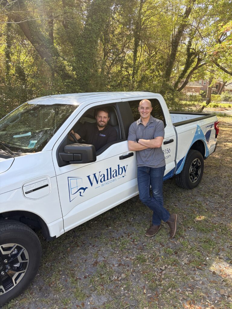 Wallaby Windows installation team with branded service truck providing expert window replacement and clean professional installs in Wilmington and Coastal Carolina