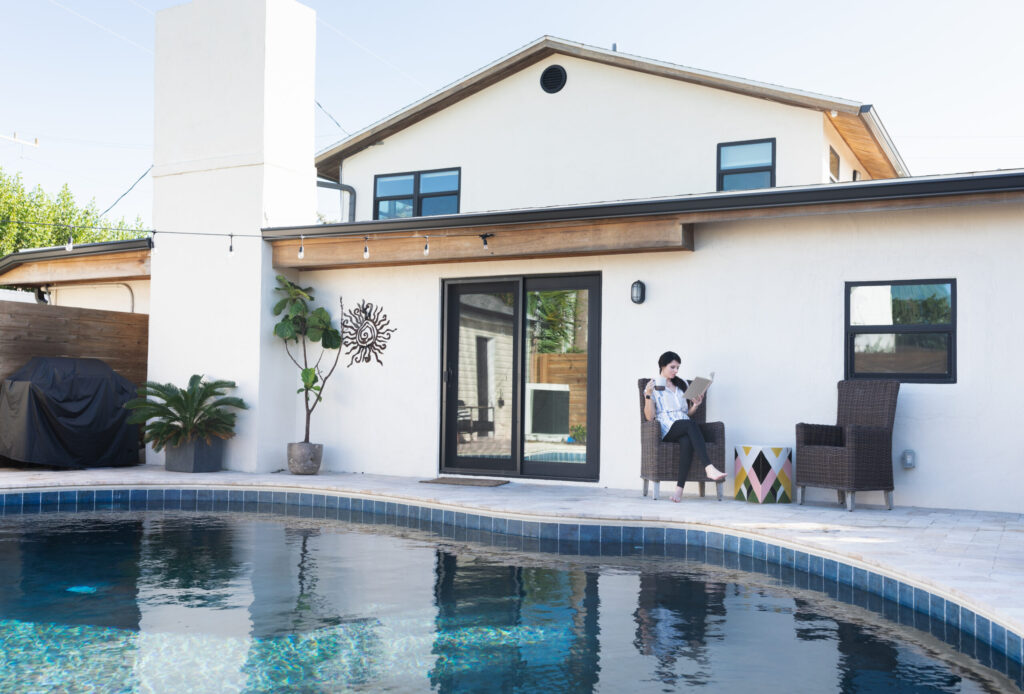Sliding glass door installed by Wallaby Windows in a Wake Forest NC home with poolside view