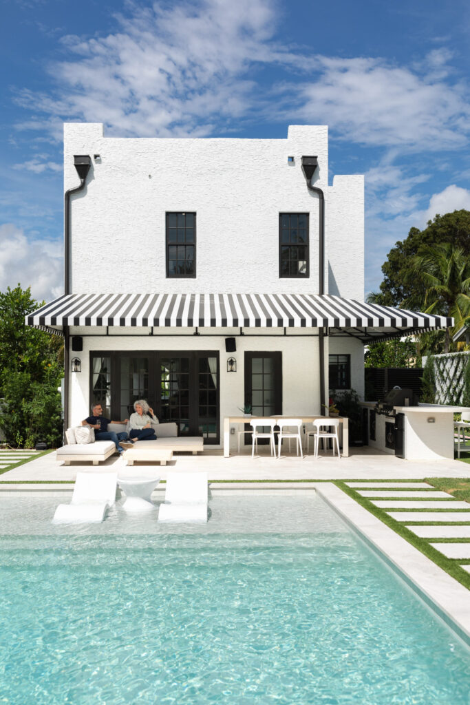 White two-story home with replacement windows installed by Wallaby Windows in Apex NC