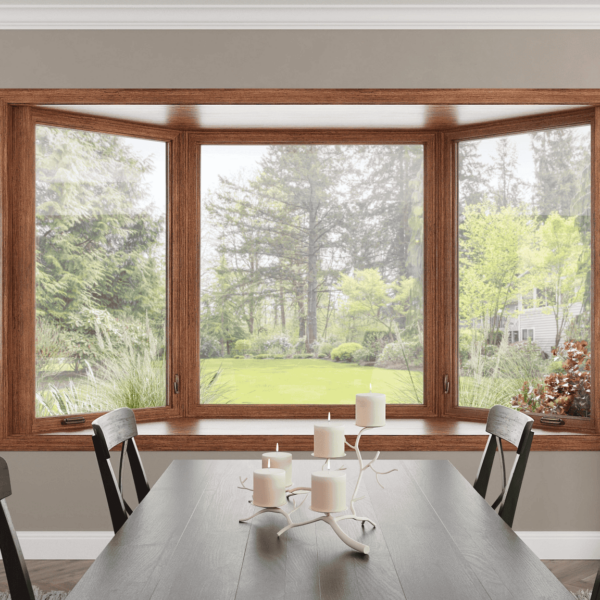 Dining room with large bow window overlooking green backyard