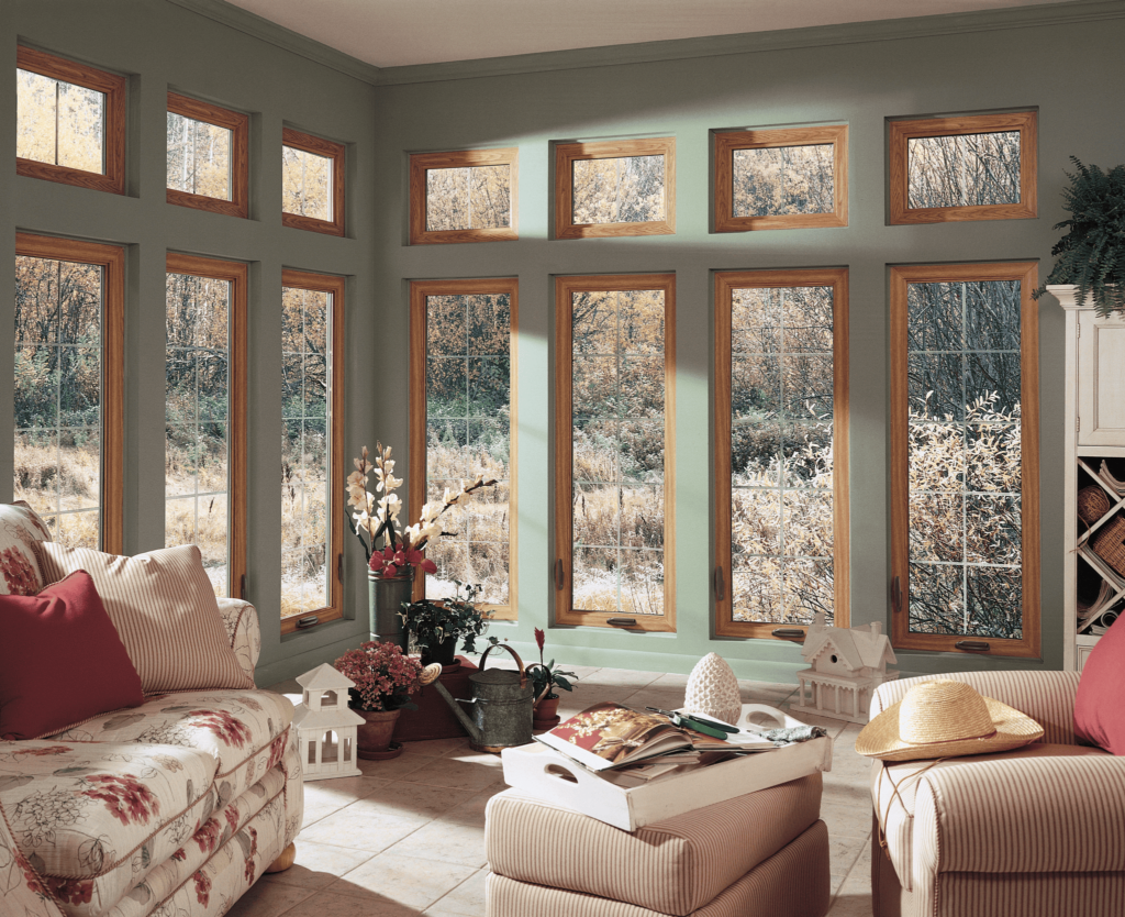 Sunroom featuring tall replacement windows installed by Wallaby Windows in Cary NC