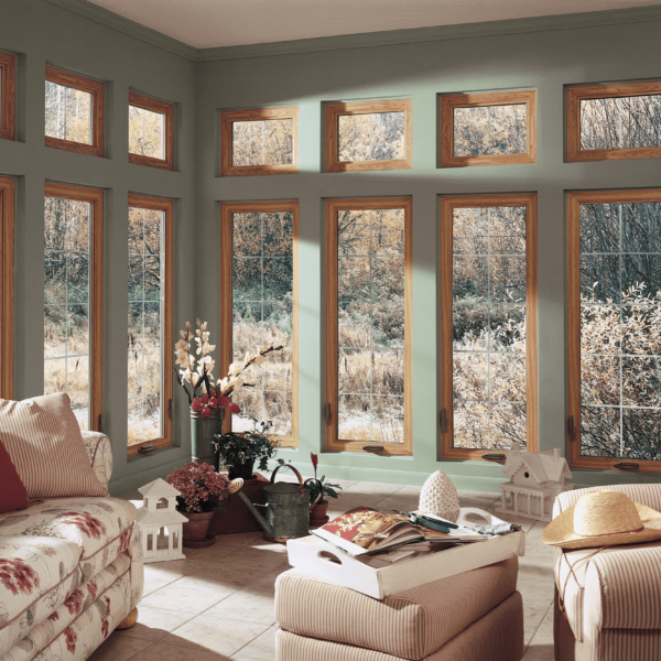 Sunroom featuring tall replacement windows installed by Wallaby Windows in Cary NC