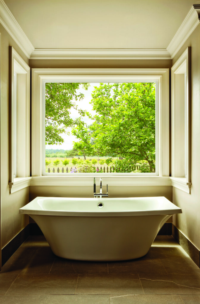 Bathroom with large picture replacement window by Wallaby Windows in Wake Forest NC