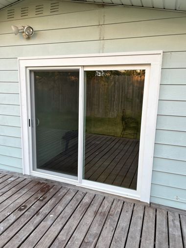 Old sliding glass door before Wallaby replacement